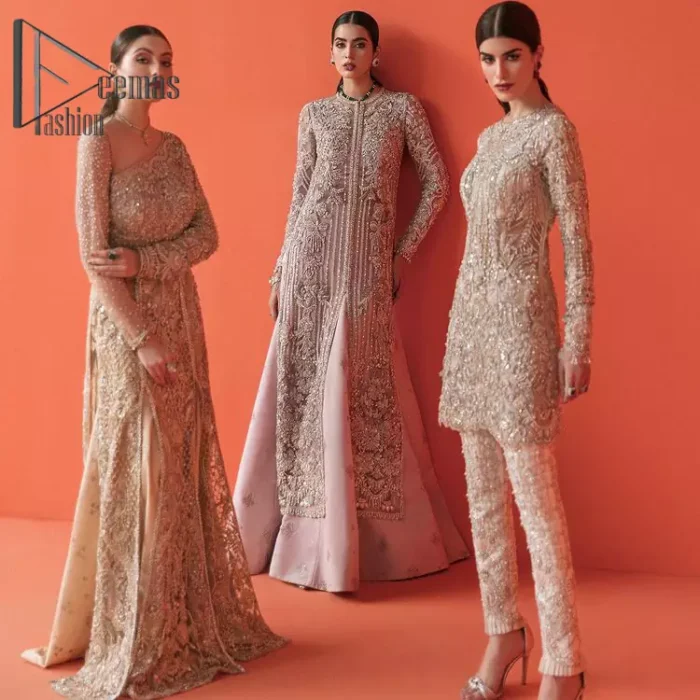 If you have a galaxy in your eyes, and immense love in your heart for your outfits then this beautiful tea rose article is just for you. This full sleeves tea rose shirt is highlighted with kora, dabka and crystal embroidery. Furthermore, Its long open-front style is looking glamorous when it pairs up with the prettiest tea rose lehenga just embellished with tiny floral motifs that give you a super-duper fairy dreamy look on any special occasion. To finish the look, go with an organza dupatta decorated with sequins spray all over.