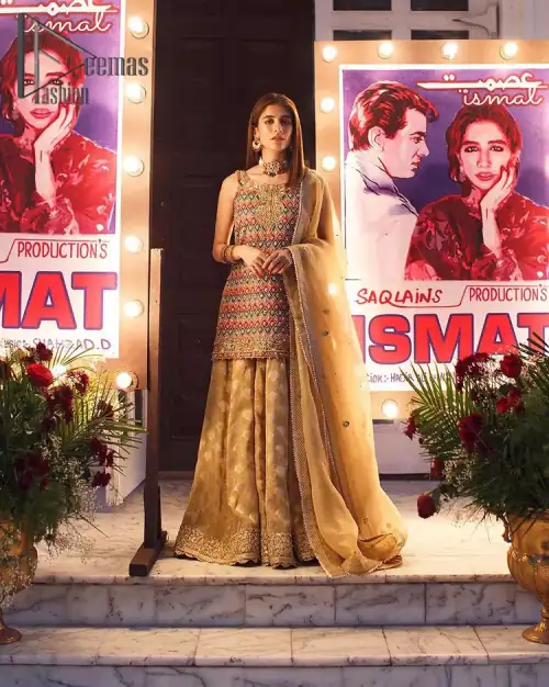 This dress is perfect for mehndi. This mehndi and mayun dress is beautifully sculptured with geometric patterns having floral motifs