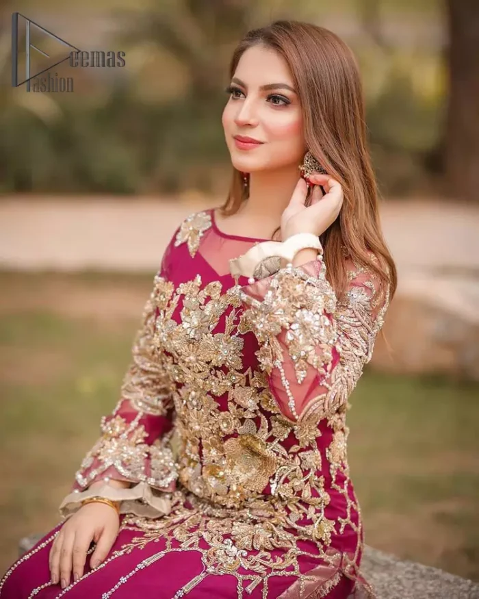 Take a step towards refreshing your wardrobe with a Shocking pink long Shirt. This dress is allured with floral embroidery. It is further enhanced with kora, dabka, kundan, sequins and pearls. It comes with raw silk trousers and enhances the art of classical heritage showcasing the craftsmanship of zardozi work on the bottom. Artistically embellished to give a beautiful rhythm to the outfit. This outfit is a perfect choice for daylight but equally breathtaking for night events.