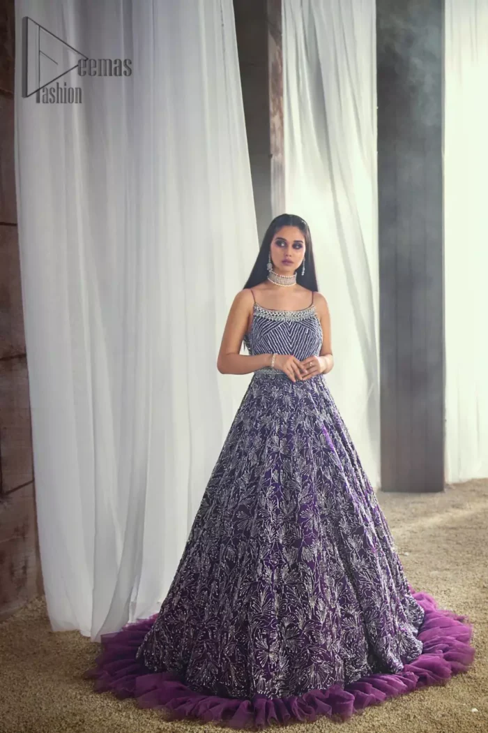Style with an unparalleled ravishing, by picking the right dress for you. Evening parties being full of entertainment are maxed up with gratification if your dress wins you the most admirers. This sleeveless Purple Frilled Maxi has the magical features to make you an evening star. Decorated with silver embroidery, and  its stunning boat-shaped neckline suits its highly enchanting silver embroidery. This Maxi is designed from 100% pure Organza Stuff that gives you artistic look on your event.