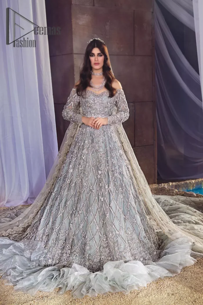 This fairy-tale ensemble is everything that you need to impress everyone at your  Walima ceremony. This off-shoulder frilled maxi is adorned with a fully embellished bodice, sleeves and fully embroidered daman is giving a perfect ending to this flare. The frilled maxi is adorned with a deep round neckline and comprises a pure D shape dupatta that looks super artistic look.