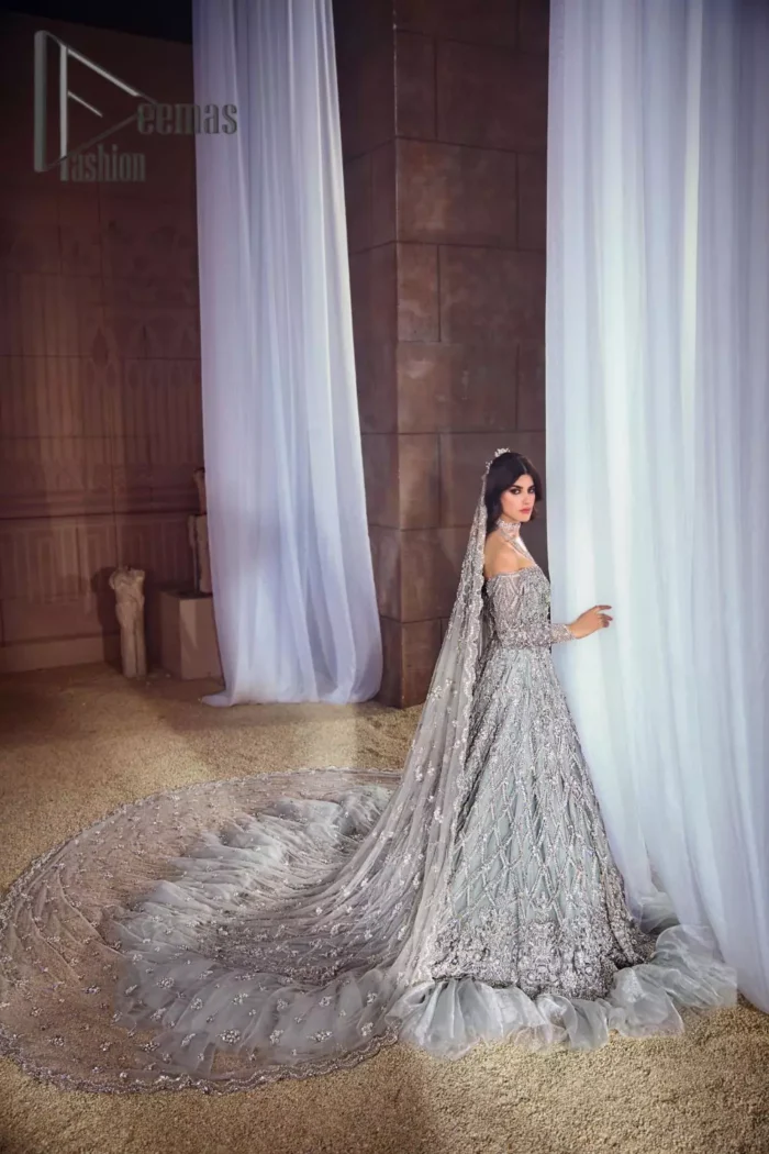 This fairy-tale ensemble is everything that you need to impress everyone at your  Walima ceremony. This off-shoulder frilled maxi is adorned with a fully embellished bodice, sleeves and fully embroidered daman is giving a perfect ending to this flare. The frilled maxi is adorned with a deep round neckline and comprises a pure D shape dupatta that looks super artistic look.