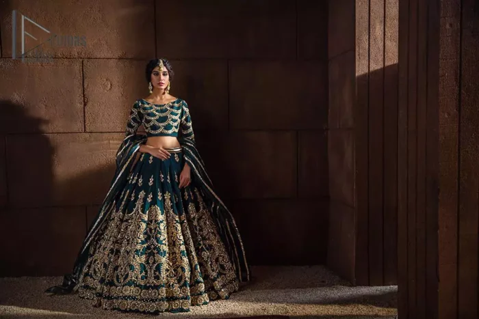 Make your day swirl and twirl in our teal blue outfit. This full sleeves teal blue blouse embellished with kora, dabka and tilla work looks stunning. Further, the boat shape neckline of this blouse is based on floral embroidery and made with pure organza. The dress accompanies a fascinating organza dupatta to perfect the beautiful formal wear. It is highlighted with a lehenga that has the power to make your look even just like the delphinium flower. The outfit enhances its beauty due to its uniqueness and the perfect fusion of modern cut and traditional embroidery.