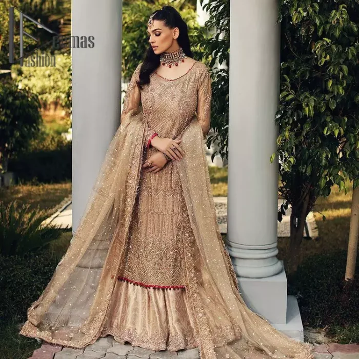 As Love Struck is a true wink of adoration so every nikkah bride is an emotion of love and a glimpse of glory shines when comes to fawn colour just like a diamond. This fawn long shirt is attractively decorated with antique embroidery that includes tilla, kora, dabka work just to give you a loving and attractive look. It is glamourously prominent with a round neckline and full sleeves as every bride wants. Pair it up with priceless fawn Gharana which is made with pure Katan banarsi jamawar. Finish this outfit with a fawn dupatta that is adorned with a four-sided embellished border and beautiful Kiran lace as well.