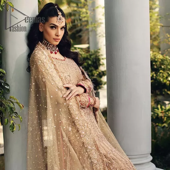 As Love Struck is a true wink of adoration so every nikkah bride is an emotion of love and a glimpse of glory shines when comes to fawn colour just like a diamond. This fawn long shirt is attractively decorated with antique embroidery that includes tilla, kora, dabka work just to give you a loving and attractive look. It is glamourously prominent with a round neckline and full sleeves as every bride wants. Pair it up with priceless fawn Gharana which is made with pure Katan banarsi jamawar. Finish this outfit with a fawn dupatta that is adorned with a four-sided embellished border and beautiful Kiran lace as well.
