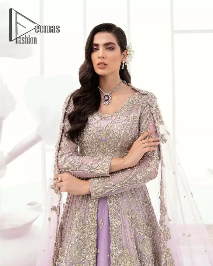 Creating the energy of modish is never been easy for a bride. So, Deemas Fashion presents the lilac front open maxi that is embellished with silver tilla, kora, and crystal soulful embroidery that all brides need for fashion. In addition to this, the V shape neckline of this maxi is looking so slayer when comes with full sleeves. Style with lilac can can lehenga that provides a glamorous look to any bride. Complete this look with a soft lilac dupatta that has a four-sided embellished border and sequins spray all over. This modish dress can be worn on your walima where you want to flaunt your style and steal everyone's heart.