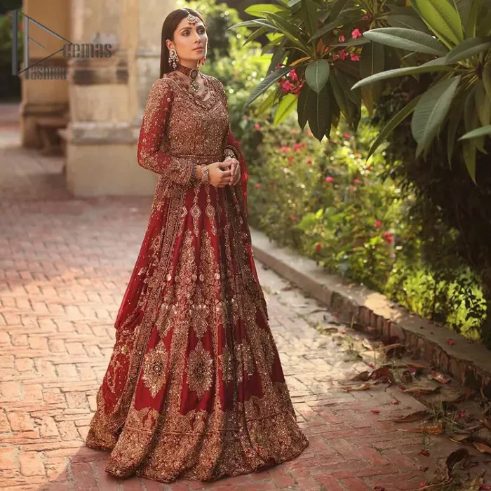 We're sure that all girls love slipping into "maroon outfits for weddings" So, we create this maroon article that will capture your moments on your big day. All details of the blouse are just amazing as it is adorned with golden tilla, kora, dabka embroidery. Just look closely at the boat shape neckline of the blouse that gives super-duper look when combine with full-length sleeves. Furthermore, it is coordinated with can can lehenga just to boost up your day by giving dreamy look. Conclude this maroon article with a chiffon dupatta that has four-sided embellished lace to capture your moments.