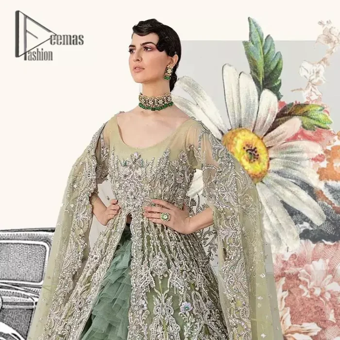 Confected on a luxury outfit with spectacular colors and contrast, this style serves for an elevated look. Delicate embroidery of maxi that involves kora, dabka, crystal work and front open style of maxi are infused together for the olive green affair. The very unbelievable sleeve style of the maxi looks super stunning and jazz up your event wardrobe. It is gracefully synchronized with a full frilled lehenga to enhance the beauty of the article. Complete this stunning look with an olive green scalloped dupatta that is embellished with four-sided borders and small motifs all around that reflect the mood of everyone.