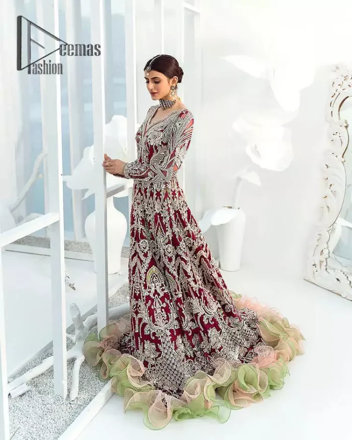 We're sure the majority of you women love slipping into "red outfits for weddings". So, Deemas Fashion presents undeniable vivacity and charming glam of red which makes a bride steal everyone's heart. This red full-sleeved maxi is made with pure organza and is adorned with silver embroidery that includes kora, dabka and tilla work. Moreover, the sweetheart neckline of the maxi is also giving a dazzling effect to this super outfit. Pair it up with a red dupatta that is embellished with four side borders and sequins spray all over that gives you a stylish and aesthetic look on your big day.