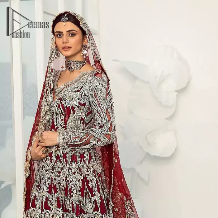 We're sure the majority of you women love slipping into "red outfits for weddings". So, Deemas Fashion presents undeniable vivacity and charming glam of red which makes a bride steal everyone's heart. This red full-sleeved maxi is made with pure organza and is adorned with silver embroidery that includes kora, dabka and tilla work. Moreover, the sweetheart neckline of the maxi is also giving a dazzling effect to this super outfit. Pair it up with a red dupatta that is embellished with four side borders and sequins spray all over that gives you a stylish and aesthetic look on your big day.