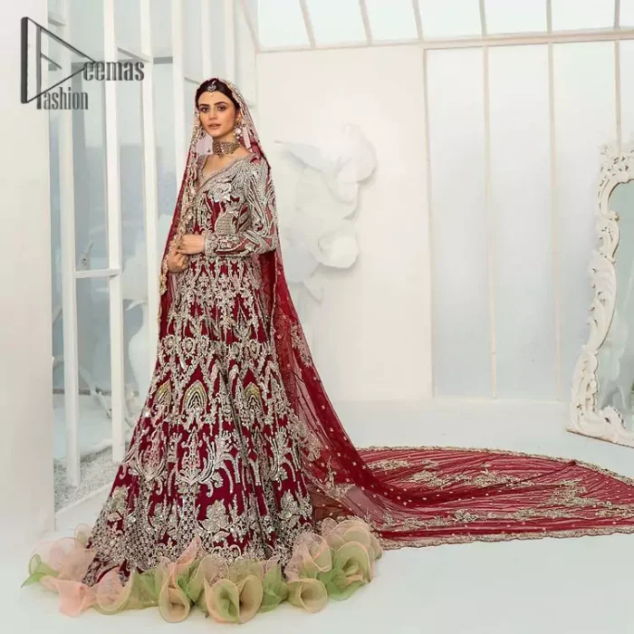 We're sure the majority of you women love slipping into "red outfits for weddings". So, Deemas Fashion presents undeniable vivacity and charming glam of red which makes a bride steal everyone's heart. This red full-sleeved maxi is made with pure organza and is adorned with silver embroidery that includes kora, dabka and tilla work. Moreover, the sweetheart neckline of the maxi is also giving a dazzling effect to this super outfit. Pair it up with a red dupatta that is embellished with four side borders and sequins spray all over that gives you a stylish and aesthetic look on your big day.