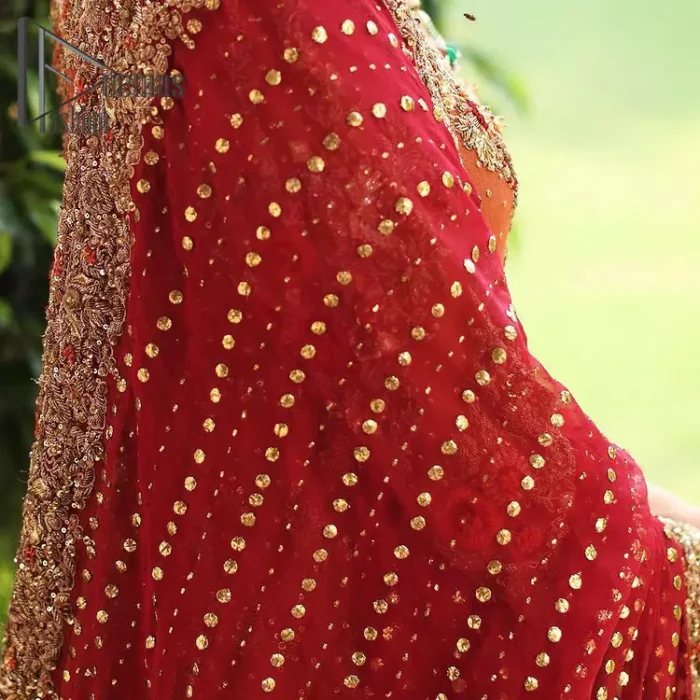 Wondering what an aesthetic bridal attire looks like? The beauty in red makes you go gaga over your look and you cannot stop snowing over you. Wearing the rust long shirt on your big day that is marvellously adorned with kora, dabka, and sequins work. Furthermore, the round neckline is also beautifully decorated to enhance the beauty of the outfit. It is synchronized with a red lehenga that has sequins sprayed all over to give you a crazy look as well. Finish this look with a red dupatta that has four-sided embellished borders as well.