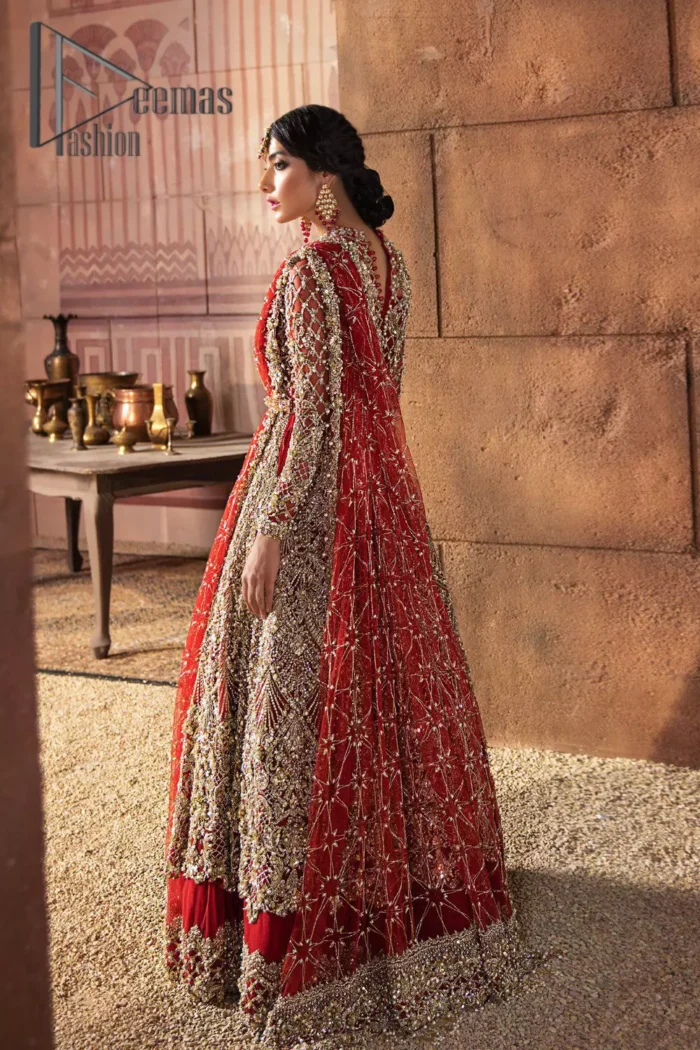 There are days in life when you fall in love with red love tone. As every bride wants red for her big day so DeemasFashion presents a bright red maxi that is heavily ornamented with golden embroidery just to make you a relaxing and romantic bride. The maxi is prominent with a jewel neckline which is added super aesthetics to your outfit. In addition to this, the full sleeves of maxi are just priceless and highlighted with kora, dabka, and tilla work. It is coordinated with the same color lehenga that's the border is heavily embellished with golden embroidery as well. Conclude this outfit with a bright red dupatta to add just the right amount to your bridal look.