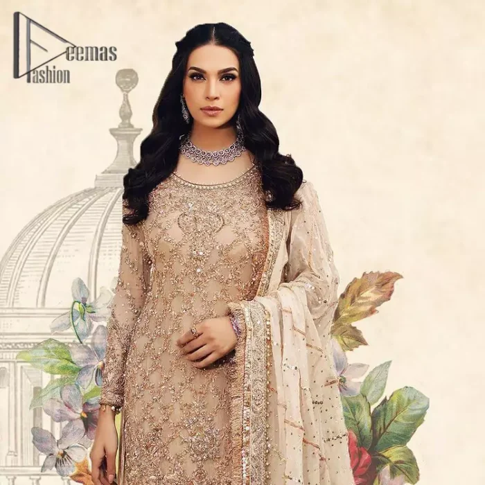 Opt for a versatile outfit for your Nikkah that is the perfect amalgamation of splendid colours, deluxe fabrication, and exquisite profile as well. Satiate your soul with extraordinary ensembles from this fawn short shirt gharara of DeemasFashion outfits. The round neckline of the short shirt is just amazing when combine with full sleeves. Further, it is highlighted with antique embroidery that includes tilla, kora, and dabka work. Pair up it with fawn gharara made with pure Katan banarsi jamawar fabric just to grant you a super aesthetic look. Complete this outfit with a fawn dupatta that is embellished with a four-sided embellished border and kiran lace as well.
