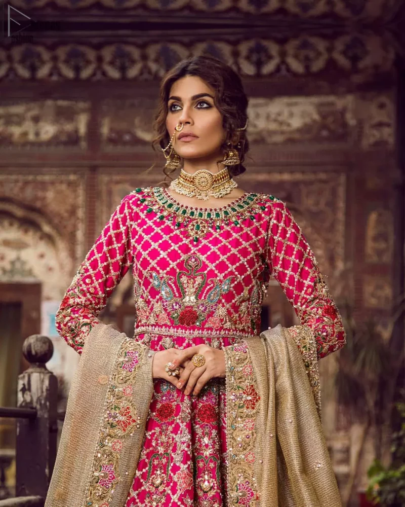 Feminine beauty needs delicate care, henceforth, Deemas Fashion introduces the most iconic bridal wears, enriched with exquisiteness at its rapture. The Mehndi Wear Shocking Pink Blouse Lehenga is the finest choice considering its gorgeousness and comfort. The dress is meticulously designed in full-sleeves, keeping the ancient royal touch preserved while the multicolour embroidery under its the extremely admirable round neckline, is just the right traditional flavour to the dress's ravishing. The designers made sure to choose the finest fabric, which is why the overall attire is made to perfection by using the purest organza. Concluding this paragon of beauty, a net dupatta sets the dress complete to glamour up your Mehendi or Walima.