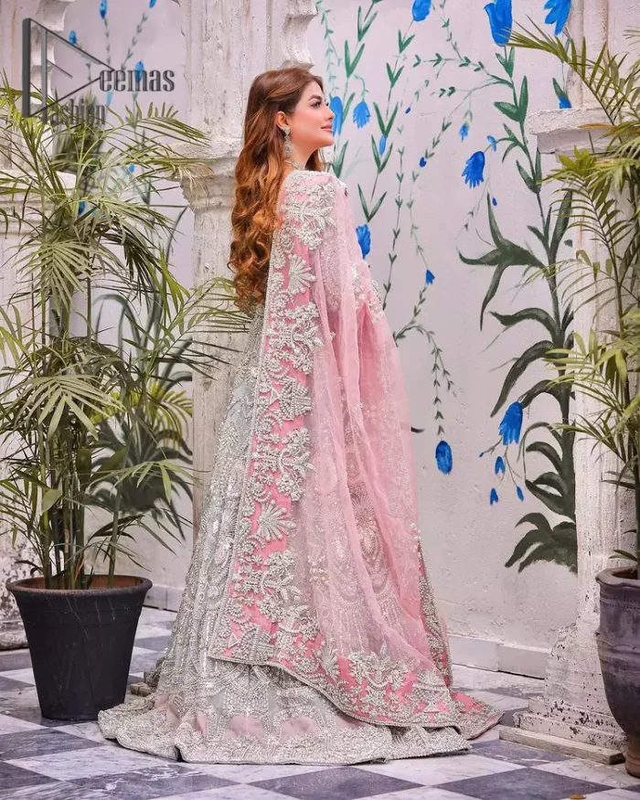 Need a quick fantastic pick for you Walima? So you're in the right place. DeemasFashion presents mint green heavy maxi that is delightfully ornamented with silver embroidery that includes kora, dabka, pearl and crystal work just to give you a lovely and pleasing look. In addition to this, the sweetheart neckline of the maxi is super stunning when comes to the combination of attractive full sleeves. It is coordinated with a pink dupatta that is embellished with four-sided beautiful embroidery just to steal your special one's heart on your walima day.