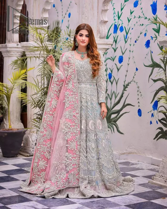 Need a quick fantastic pick for you walima? So you're in the right place. DeemasFashion presents mint green heavy maxi that is delightfully ornamented with silver embroidery that includes kora, dabka, pearl, antique, and crystal work just to give you a lovely and pleasing look. In addition to this, the V neckline of the maxi is super stunning when comes to the combination of attractive full sleeves. It is coordinated with a pink dupatta that is embellished with four-sided beautiful embroidery just to steal your special one's heart on your walima day.
