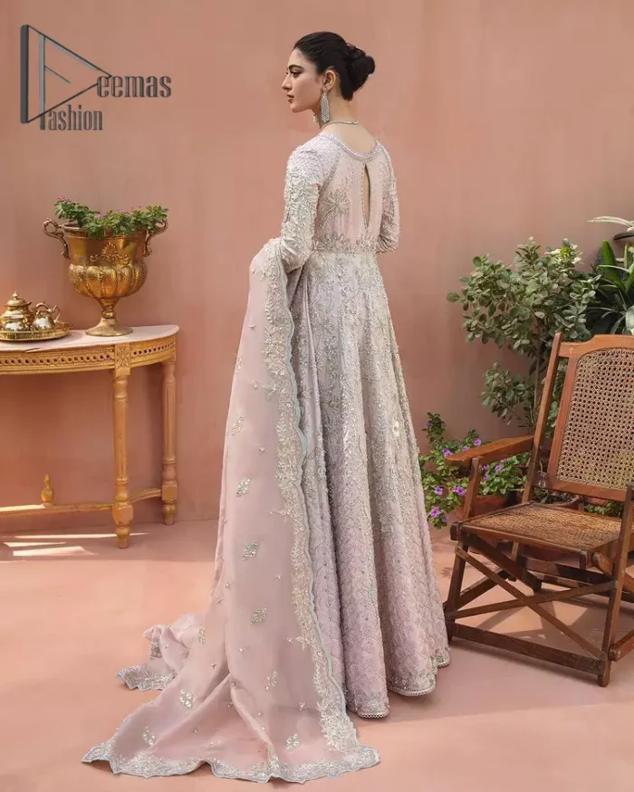 A true epitome of elegance. Confected ever so beautifully with the oyster pink colour palette and eye-catching embroidery. The ouster pink maxi is splendid just because of its multiple colour embroidery which is involved with tilla, dabka, kora and pearls. Further, it is prominent with its V shape neckline that grants pleasure to you on your walima day when combine with full sleeves. Complete this oyster pink outfit with a dupatta that is ornamented with embellished border and sequins spray just to fulfil your dream.