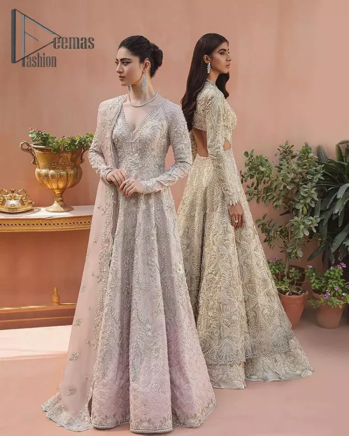 A true epitome of elegance. Confected ever so beautifully with the oyster pink colour palette and eye-catching embroidery. The ouster pink maxi is splendid just because of its multiple colour embroidery which is involved with tilla, dabka, kora and pearls. Further, it is prominent with its V shape neckline that grants pleasure to you on your walima day when combine with full sleeves. Complete this oyster pink outfit with a dupatta that is ornamented with embellished border and sequins spray just to fulfil your dream.