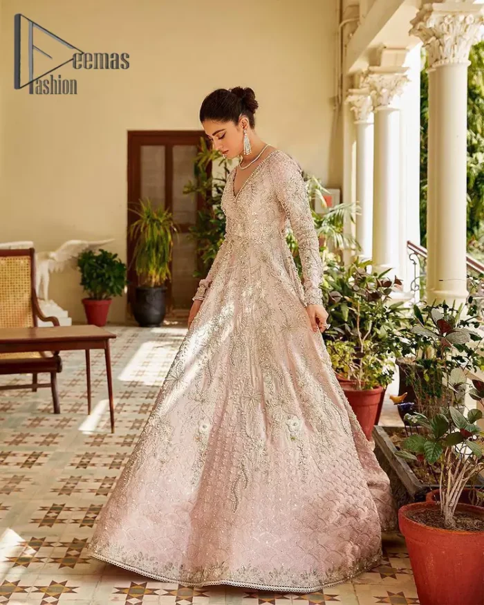 A true epitome of elegance. Confected ever so beautifully with the oyster pink colour palette and eye-catching embroidery. The ouster pink maxi is splendid just because of its multiple colour embroidery which is involved with tilla, dabka, kora and pearls. Further, it is prominent with its V shape neckline that grants pleasure to you on your walima day when combine with full sleeves. Complete this oyster pink outfit with a dupatta that is ornamented with embellished border and sequins spray just to fulfil your dream.