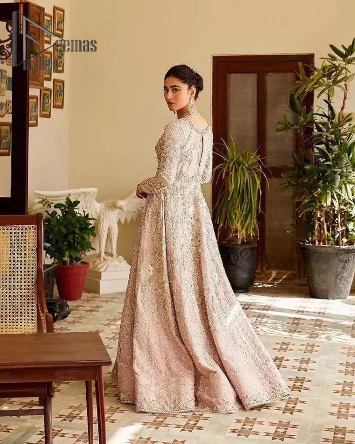A true epitome of elegance. Confected ever so beautifully with the oyster pink colour palette and eye-catching embroidery. The ouster pink maxi is splendid just because of its multiple colour embroidery which is involved with tilla, dabka, kora and pearls. Further, it is prominent with its V shape neckline that grants pleasure to you on your walima day when combine with full sleeves. Complete this oyster pink outfit with a dupatta that is ornamented with embellished border and sequins spray just to fulfil your dream.