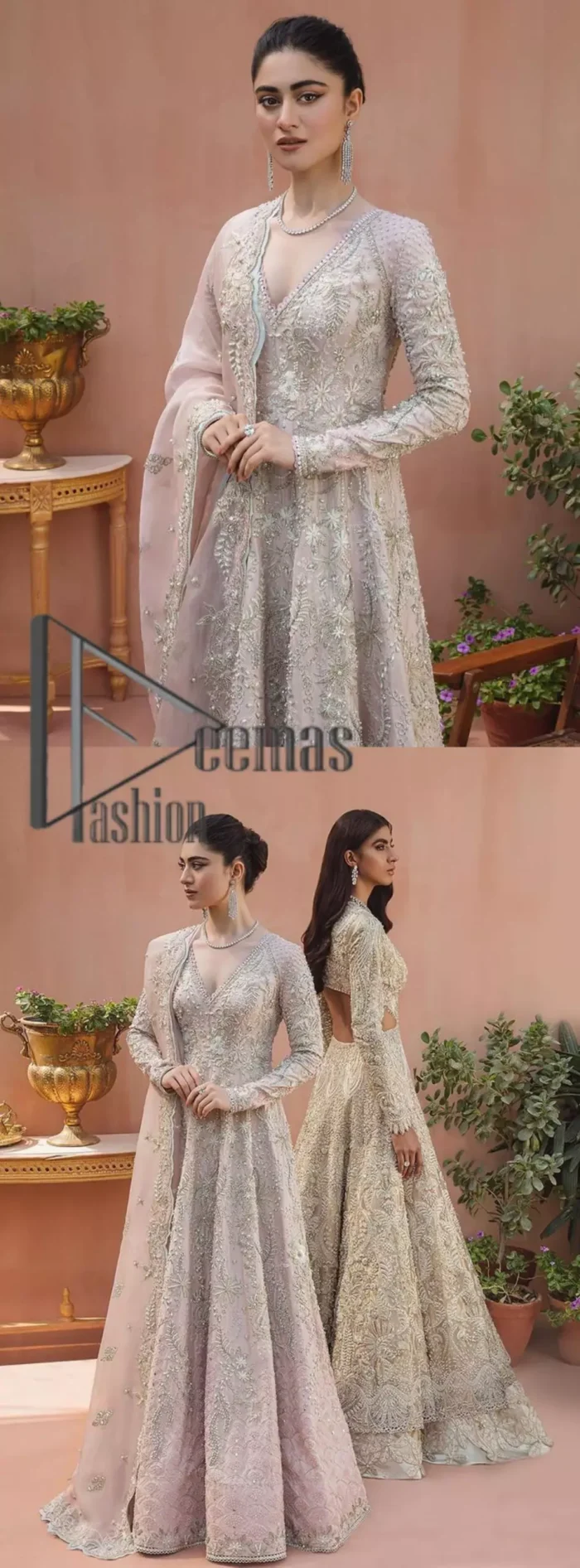 A true epitome of elegance. Confected ever so beautifully with the oyster pink colour palette and eye-catching embroidery. The ouster pink maxi is splendid just because of its multiple colour embroidery which is involved with tilla, dabka, kora and pearls. Further, it is prominent with its V shape neckline that grants pleasure to you on your walima day when combine with full sleeves. Complete this oyster pink outfit with a dupatta that is ornamented with embellished border and sequins spray just to fulfil your dream.
