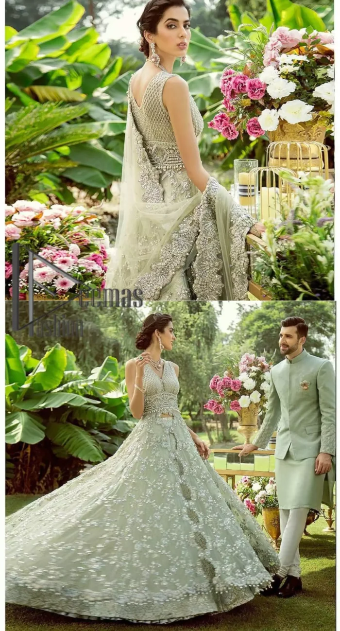 Dare to wear, Oh so bling and slaying like never before. It's an outfit of power and glam. The pistachio green maxi is a breathtaking assortment of sequins, pearls and crystals. The V shape neckline has enhanced the beauty of this pistachio maxi which is attractively combined with a sleeveless style. Further, it is prominent with silver and light golden embroidery. Pair up this maxi with the same colour lehenga. Complete this article with a dupatta which is intensified with intricate embroidered border and sequins spray all so you can steal everyone's heart on your walima day.