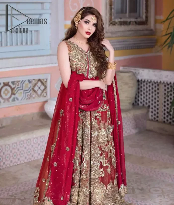 She's a divine, a diety, a vision, a gift. She is a girl in Florence, wrapped in a flare and dreaming about her big day. Welcoming your guest in the red front open maxi which is handsomely decorated with beautiful embroidery. It is reflected with golden tilla, kora, zardozi and pearls. The maxi is further intensified with V shape neckline with a sleeveless style. It is synchronized with a red dupatta that is also embellished with a four-sided golden embroidery. Further, the dupatta is adorned with floral motifs and sequins sprayed all over so that you can achieve your dreamy look on your big day.