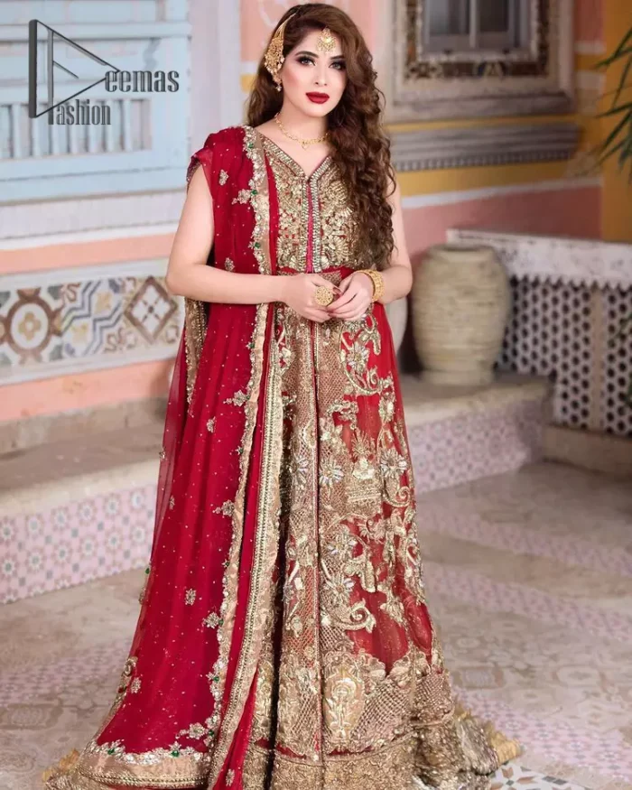 She's a divine, a diety, a vision, a gift. She is a girl in Florence, wrapped in a flare and dreaming about her big day. Welcoming your guest in the red front open maxi which is handsomely decorated with beautiful embroidery. It is reflected with golden tilla, kora, zardozi and pearls. The maxi is further intensified with V shape neckline with a sleeveless style. It is synchronized with a red dupatta that is also embellished with a four-sided golden embroidery. Further, the dupatta is adorned with floral motifs and sequins sprayed all over so that you can achieve your dreamy look on your big day.