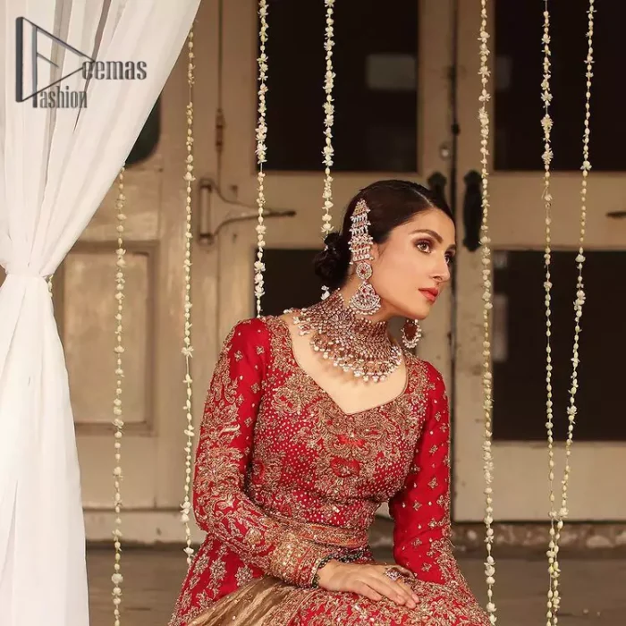 Dress up for your occasion, it's time to dance on your big day. Give a fresh twist to your wedding Big day outfits with this eye-catching red article. Reveal your day with the red heavy blouse that is attractively adorned with golden embroidery which includes tilla, dabka, kora work so that you can embezzle everyone's attraction. In addition to this, the sweetheart neckline of the blouse is just soothing when comes with full sleeves. The blouse is coordinated with a red lehenga that is heavily embellished with marvellous embroidery to give you a queen look. Complete this outfit with a golden dupatta which enhanced the beauty of the outfit.