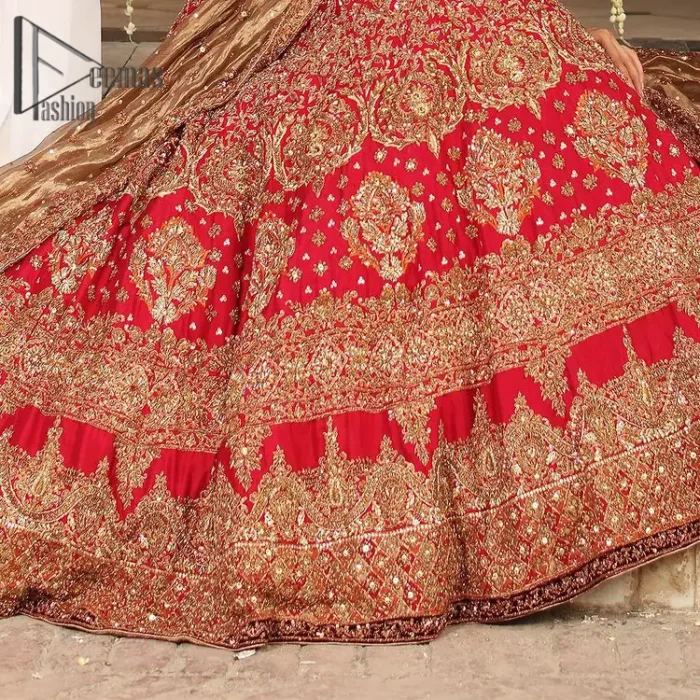 Dress up for your occasion, it's time to dance on your big day. Give a fresh twist to your wedding Big day outfits with this eye-catching red article. Reveal your day with the red heavy blouse that is attractively adorned with golden embroidery which includes tilla, dabka, kora work so that you can embezzle everyone's attraction. In addition to this, the sweetheart neckline of the blouse is just soothing when comes with full sleeves. The blouse is coordinated with a red lehenga that is heavily embellished with marvellous embroidery to give you a queen look. Complete this outfit with a golden dupatta which enhanced the beauty of the outfit.