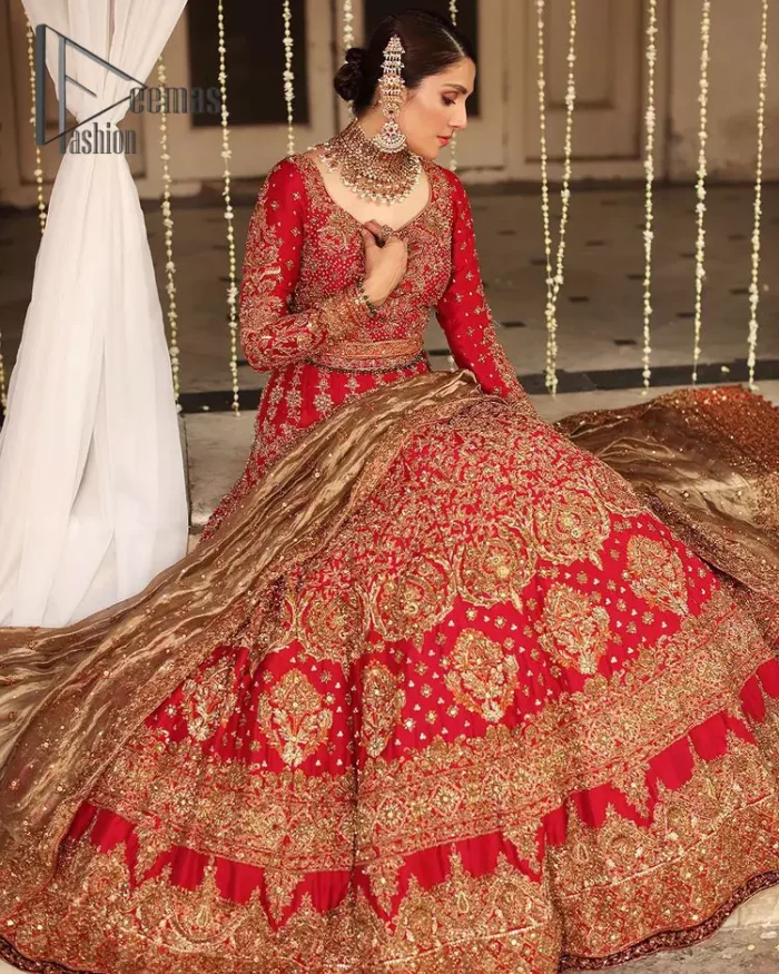 Dress up for your occasion, it's time to dance on your big day. Give a fresh twist to your wedding Big day outfits with this eye-catching red article. Reveal your day with the red heavy blouse that is attractively adorned with golden embroidery which includes tilla, dabka, kora work so that you can embezzle everyone's attraction. In addition to this, the sweetheart neckline of the blouse is just soothing when comes with full sleeves. The blouse is coordinated with a red lehenga that is heavily embellished with marvellous embroidery to give you a queen look. Complete this outfit with a golden dupatta which enhanced the beauty of the outfit.
