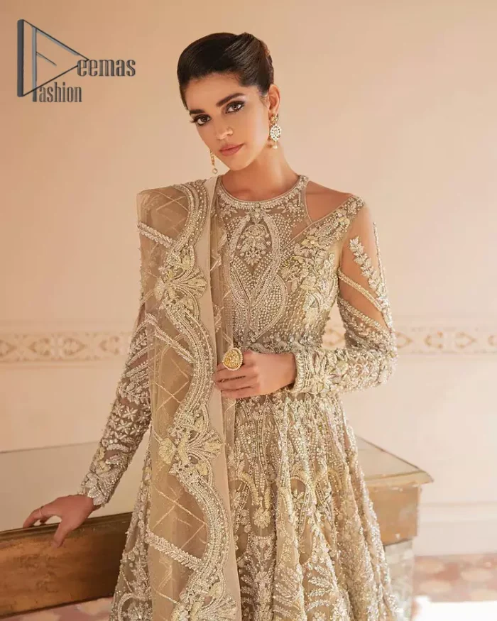 Something to Beige about! This article is specially presented by DeemasFashion featuring thoughtfully designed ensembles with a rich beige colour maxi and dupatta that are flattering on the body's quintessential details. The round neckline of the maxi is attractively combined with the back train that is heavily adorned with silver dabka, tilla,m zardozi embroidery for the finest look. In addition to this, it is paired up with the same colour dupatta that is again ornamented with \a four-sided border and sequins spray all over to fulfil your finest promising look on your walima day. 