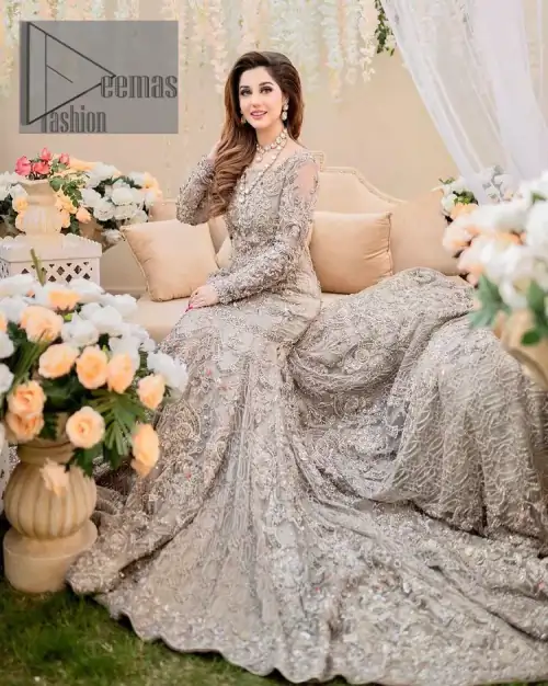Embrace happiness on your Walima in the colour of beige-pink along this dreamiest fairy tail maxi. The floral fusion of