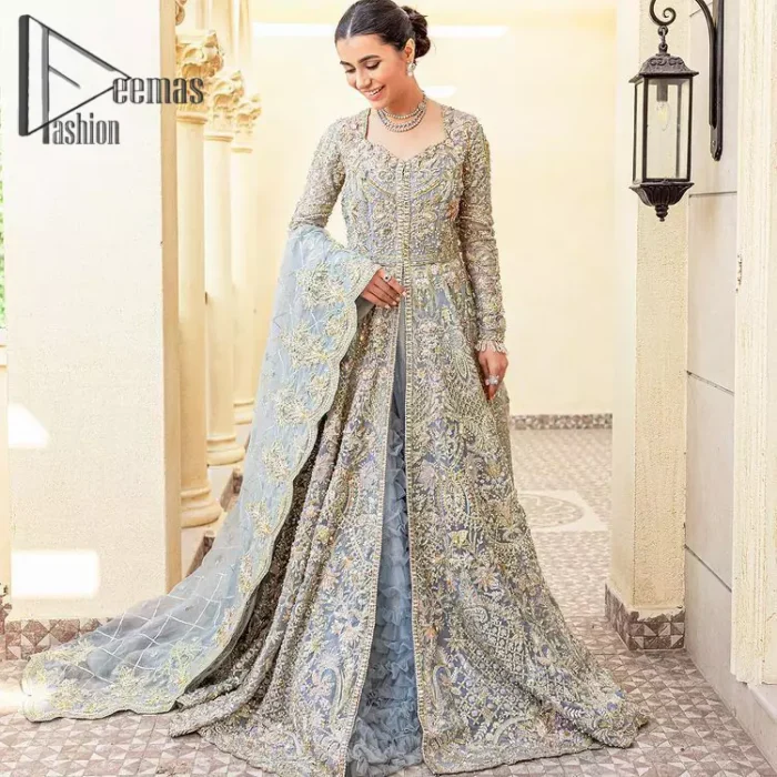 Something to blue about!. Trust on DeemasFashion to bring the magic of light blue colour for you on your walima day. Starting this outfit with a light blue front open maxi which is appealing with silver embroidery. The embroidery is further prominent with tilla, kora, zardozi and pearls work to raise the loveliness of the outfit. It is paired up with a full frilled lehenga that is designed just to express the feelings of a dreamy fairy on your Walima day. Complete this light blue outfit with the same colour scallop[ed dupatta that is adorned with a four-sided embellished border and sequins spray all over. 