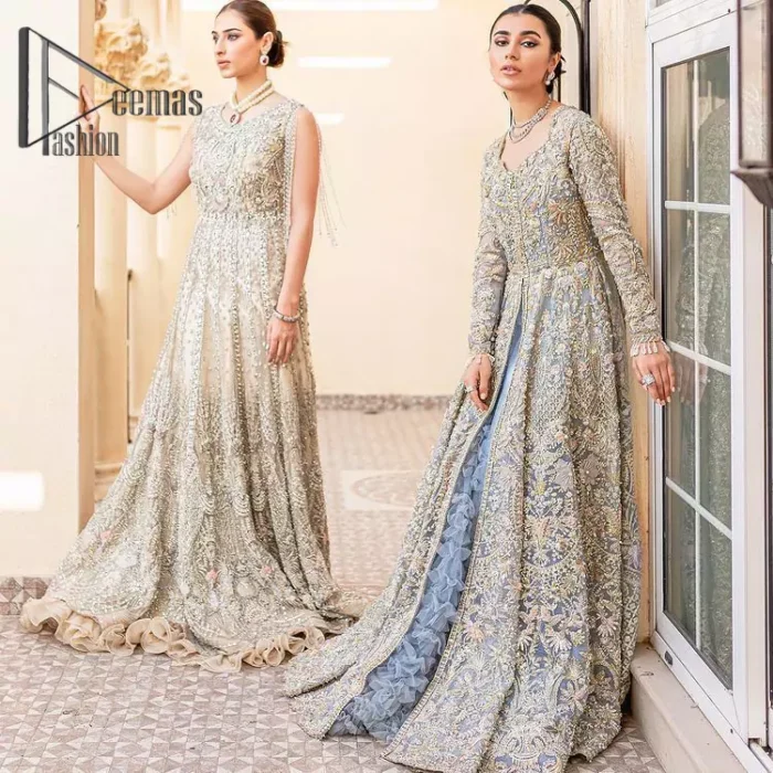 Something to blue about!. Trust on DeemasFashion to bring the magic of light blue colour for you on your walima day. Starting this outfit with a light blue front open maxi which is appealing with silver embroidery. The embroidery is further prominent with tilla, kora, zardozi and pearls work to raise the loveliness of the outfit. It is paired up with a full frilled lehenga that is designed just to express the feelings of a dreamy fairy on your Walima day. Complete this light blue outfit with the same colour scallop[ed dupatta that is adorned with a four-sided embellished border and sequins spray all over. 