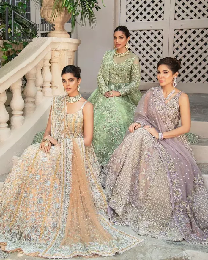 We know for most the girls a wedding dress represents more than just love. For our real brides, we present a lilac multiple panel maxi which is the embodiment of a dream and beautifully embellished with silver tilla, dabka and kora work. Furthermore, the sleeveless style of this multiple panel maxi is super amazing with V shape neckline just to introduce our love for the brides. This lilac maxi is organized with golden lehenga just to give the contrast to your walima day which is embellished with embroidery. Finish this look with a lilac dupatta which is heavily embellished with a four-sided border and sequins sprayed all over.