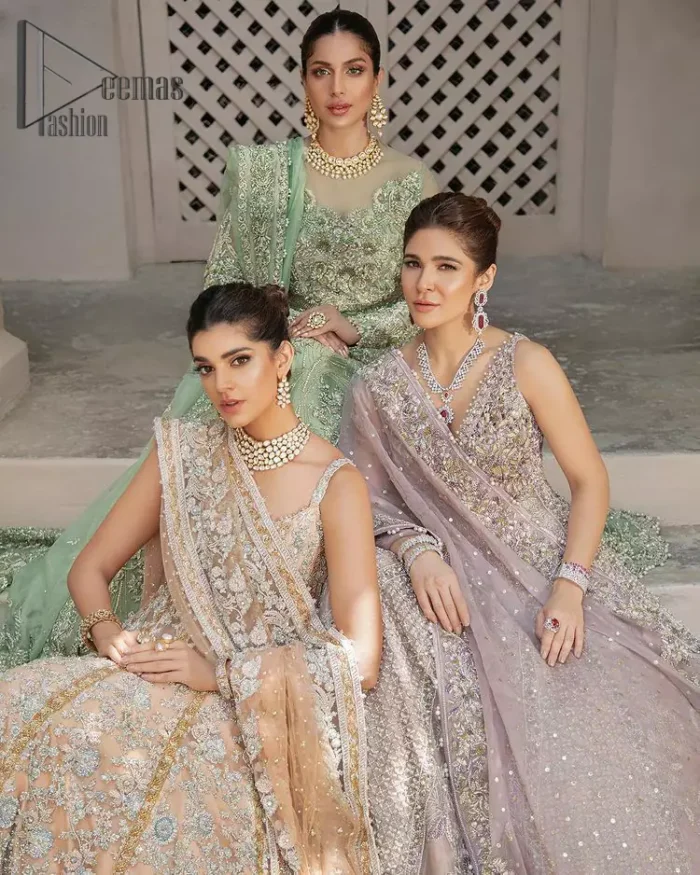 We know for most the girls a wedding dress represents more than just love. For our real brides, we present a lilac multiple panel maxi which is the embodiment of a dream and beautifully embellished with silver tilla, dabka and kora work. Furthermore, the sleeveless style of this multiple panel maxi is super amazing with V shape neckline just to introduce our love for the brides. This lilac maxi is organized with golden lehenga just to give the contrast to your walima day which is embellished with embroidery. Finish this look with a lilac dupatta which is heavily embellished with a four-sided border and sequins sprayed all over.