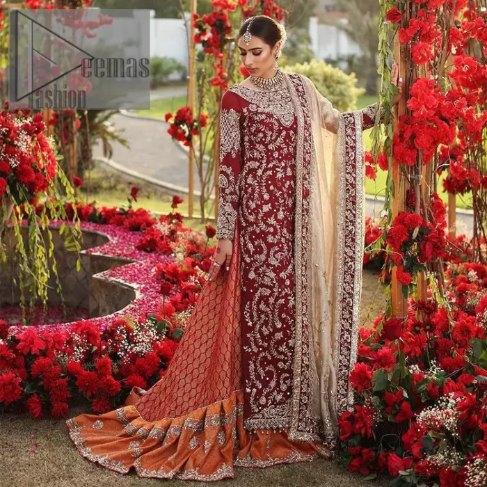 She's headstrong and rebellious, determined to divert the pacts of tradition on her Big day. Presenting a Red long shirt of DeemasFashion which is attractively ornamented with silver embroidery which involves kora, dabka, and zardozi work. It is especially highlighted with full sleeves which enhance the charmless of the article when combine with boat shape neckline. Pair up with an orange back train lehenga which is made up of pure jamawar that gives a super aesthetic and traditional look to every bride. End up this lovely look with a light golden dupatta which is embellished with a four-sided border just to fulfil the traditional gentle look. 