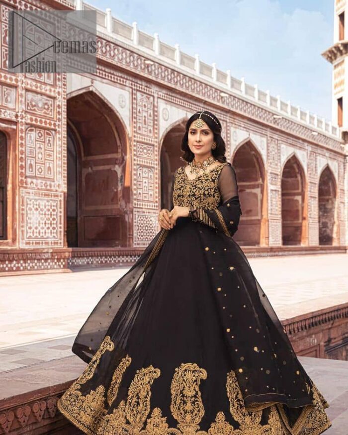 Black is just associated with a romantic evening. To make your event super dazzling and take a title of the start of the night so just go with our black can-can maxi. The body of the maxi is finished with golden embroidery which embraces golden tilla, dabka, kora and zardozi work. The full sleeves of the maxi added an astonishing vibe when paired up with the V shape neckline. Furthermore, the bottom line of the maxi is again embellished with heavy golden work. It is organized with a black dupatta which is embellished with four-sided borders and sequins sprayed all over.