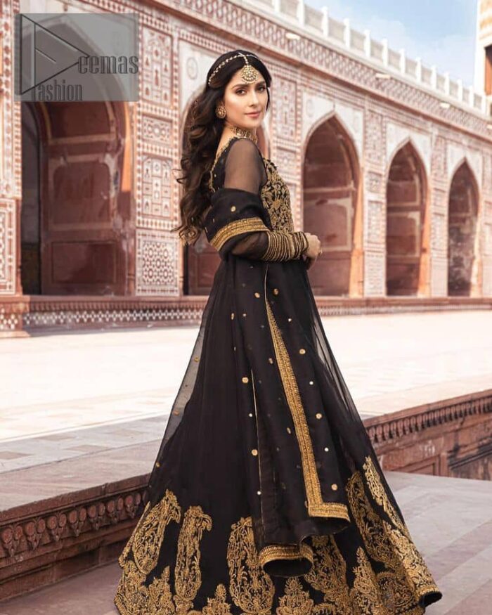 Black is just associated with a romantic evening. To make your event super dazzling and take a title of the start of the night so just go with our black can-can maxi. The body of the maxi is finished with golden embroidery which embraces golden tilla, dabka, kora and zardozi work. The full sleeves of the maxi added an astonishing vibe when paired up with the V shape neckline. Furthermore, the bottom line of the maxi is again embellished with heavy golden work. It is organized with a black dupatta which is embellished with four-sided borders and sequins sprayed all over.