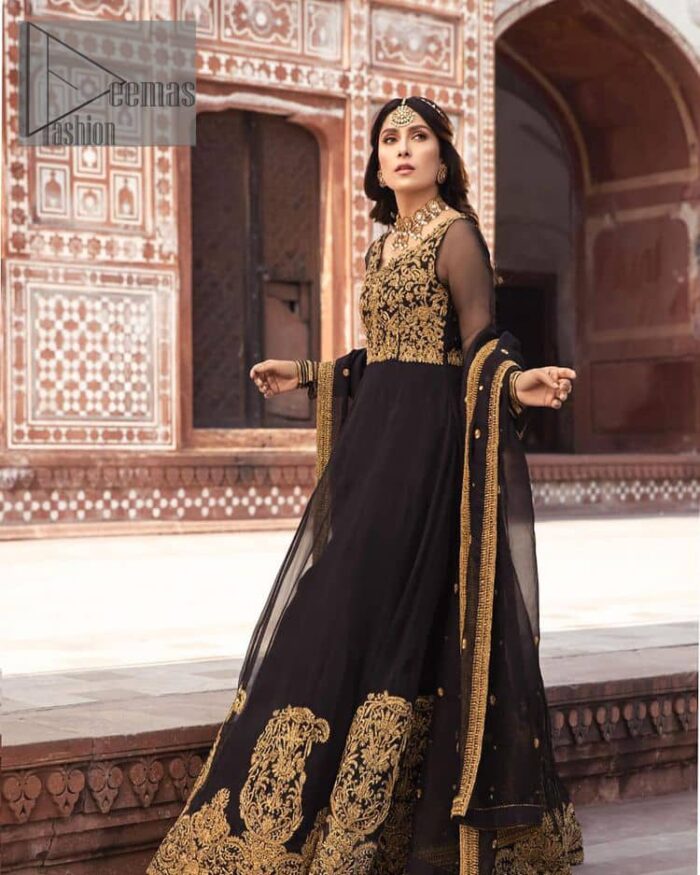 Black is just associated with a romantic evening. To make your event super dazzling and take a title of the start of the night so just go with our black can-can maxi. The body of the maxi is finished with golden embroidery which embraces golden tilla, dabka, kora and zardozi work. The full sleeves of the maxi added an astonishing vibe when paired up with the V shape neckline. Furthermore, the bottom line of the maxi is again embellished with heavy golden work. It is organized with a black dupatta which is embellished with four-sided borders and sequins sprayed all over.