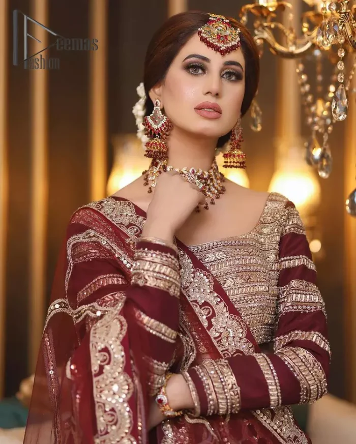 Attain your expectations on your big day with this dress. The classically vibrant combination of red and gold is a true image of elegance. Red Short Blouse - Lehanga Dupatta.