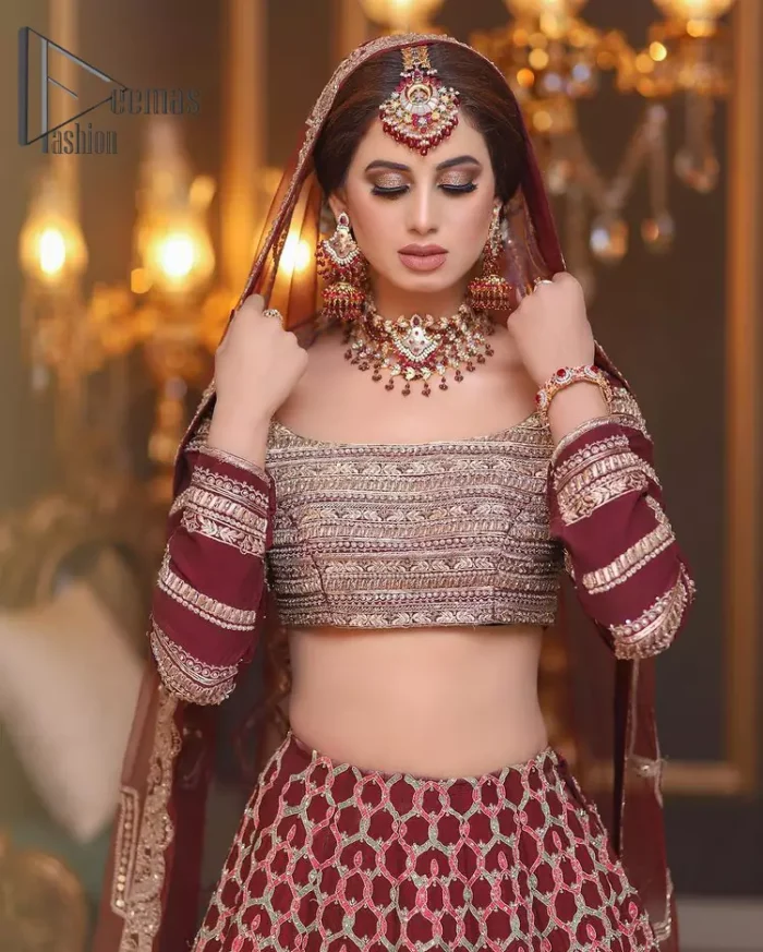 Attain your expectations on your big day with this dress. The classically vibrant combination of red and gold is a true image of elegance. Red Short Blouse - Lehanga Dupatta.