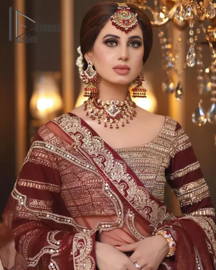 Attain your expectations on your big day with this dress. The classically vibrant combination of red and gold is a true image of elegance. Red Short Blouse - Lehanga Dupatta.