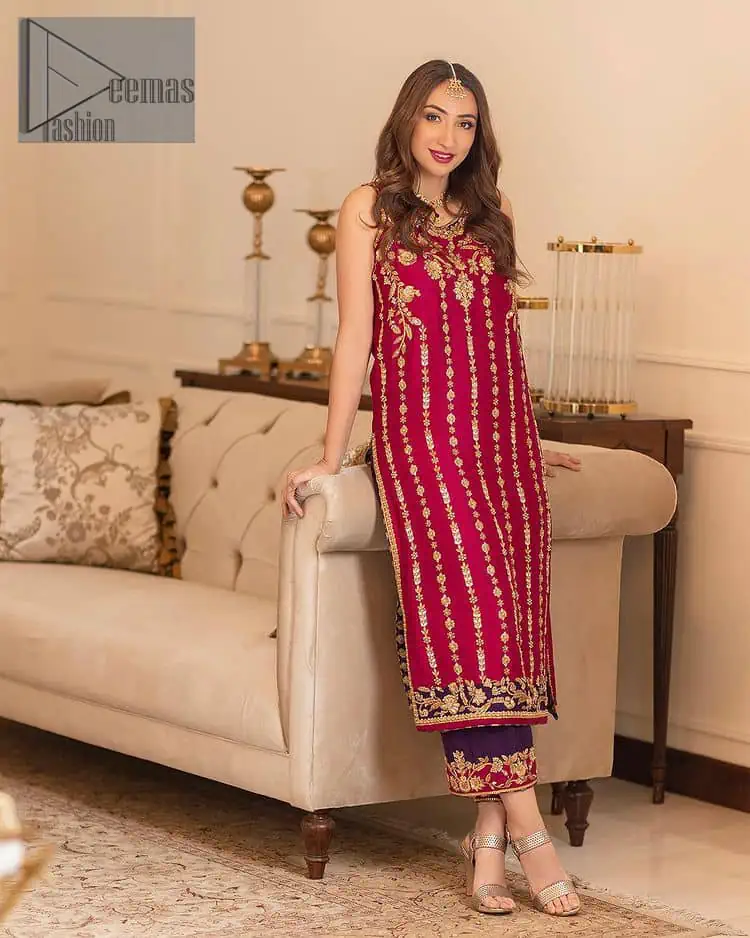 The golden pasting on a glamorous magenta canvas. The beautiful attire is presented that begins with a magenta long shirt which is attractively furnished with golden embroidery. It is spotlighted with tilla, dabka, kora and zardozi to make your event blazing and astonishing. In addition to this, it is attractively featured with a round neckline and sleeveless style. The following magenta long shirt is paired up with purple trousers that's border is again embellished with golden embroidery that gives a unique piece of style in every function.