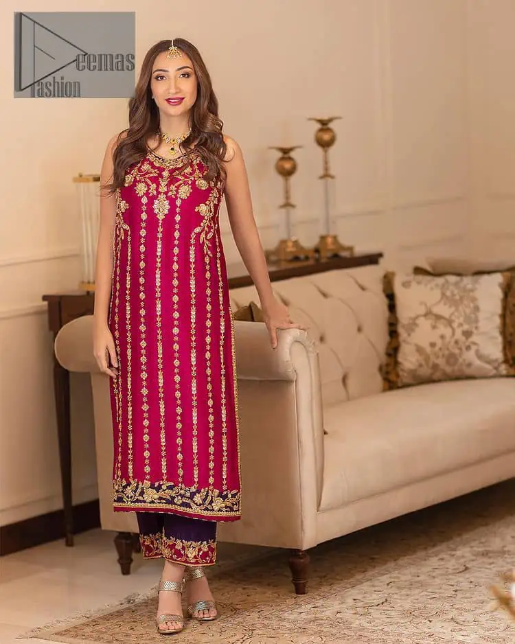 The golden pasting on a glamorous magenta canvas. The beautiful attire is presented that begins with a magenta long shirt which is attractively furnished with golden embroidery. It is spotlighted with tilla, dabka, kora and zardozi to make your event blazing and astonishing. In addition to this, it is attractively featured with a round neckline and sleeveless style. The following magenta long shirt is paired up with purple trousers that's border is again embellished with golden embroidery that gives a unique piece of style in every function.