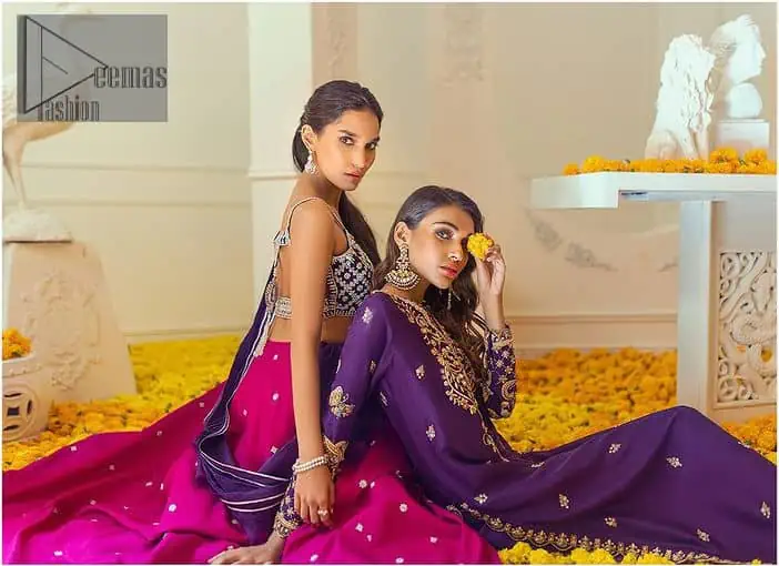 The magenta and purple imitation of traditional crafted patterns on the luxury outfits. The beautiful purple blouse is rendered with handsome silver embellishment. It is highlighted with kora, dabka, crystal and zardozi embroidery. The sleeveless style gives an attractive layer when comes with a strap neckline. The following shirt comes with an intricately embellished magenta can can lehenga to embrace the superstar look. Complete this article with an exquisite purple dupatta adorned with a lushly encrusted border. The beautiful frill in the same hue is also attached.