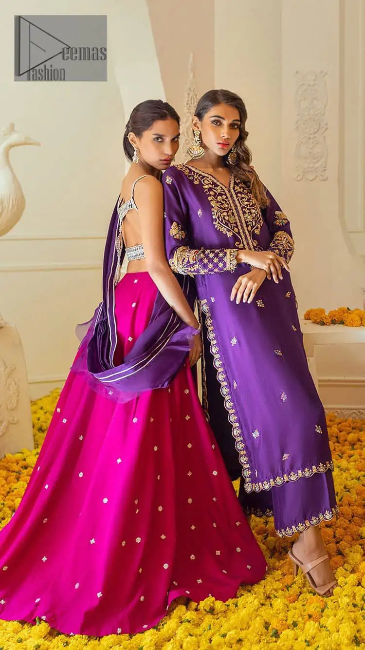The magenta and purple imitation of traditional crafted patterns on the luxury outfits. The beautiful purple blouse is rendered with handsome silver embellishment. It is highlighted with kora, dabka, crystal and zardozi embroidery. The sleeveless style gives an attractive layer when comes with a strap neckline. The following shirt comes with an intricately embellished magenta can can lehenga to embrace the superstar look. Complete this article with an exquisite purple dupatta adorned with a lushly encrusted border. The beautiful frill in the same hue is also attached.