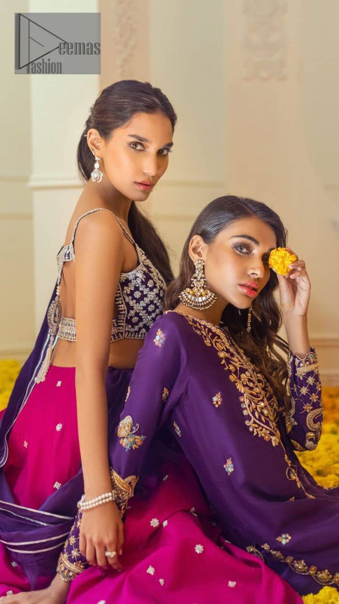 The magenta and purple imitation of traditional crafted patterns on the luxury outfits. The beautiful purple blouse is rendered with handsome silver embellishment. It is highlighted with kora, dabka, crystal and zardozi embroidery. The sleeveless style gives an attractive layer when comes with a strap neckline. The following shirt comes with an intricately embellished magenta can can lehenga to embrace the superstar look. Complete this article with an exquisite purple dupatta adorned with a lushly encrusted border. The beautiful frill in the same hue is also attached.